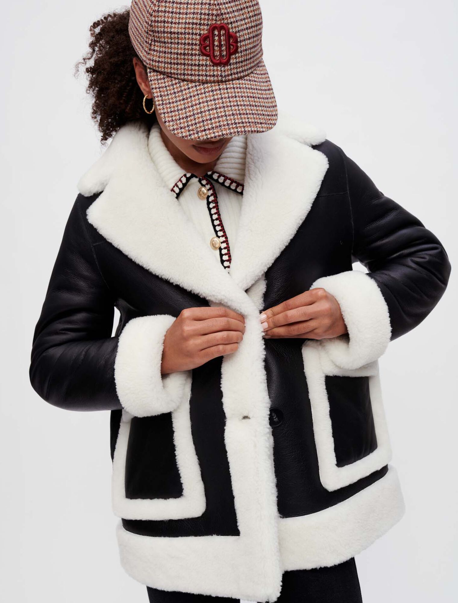 Cappotto in shearling bicolore