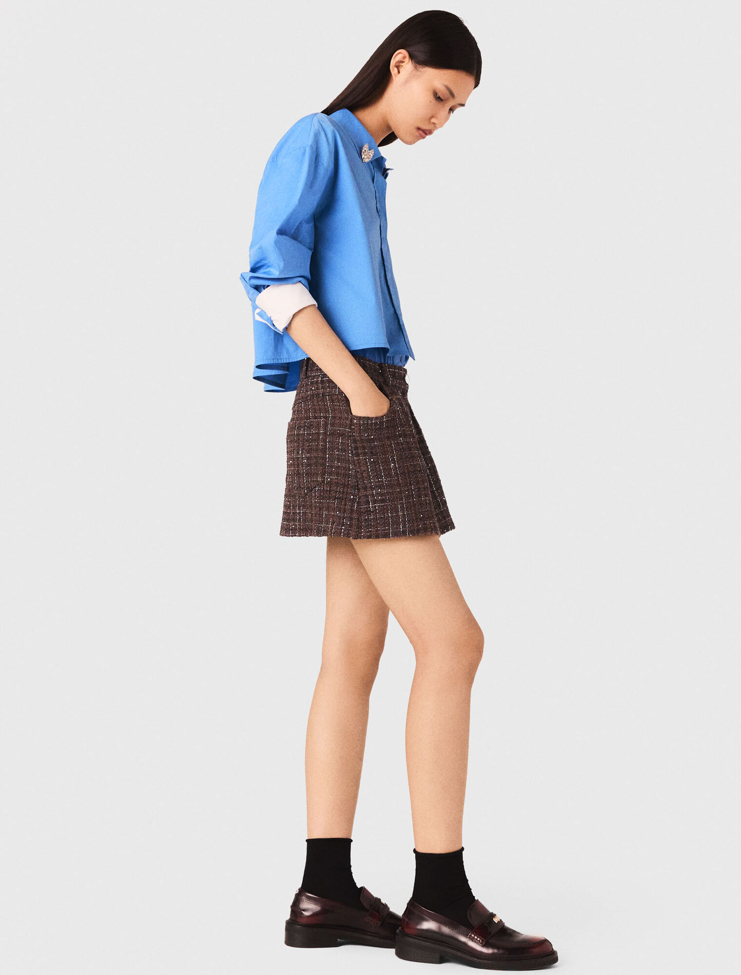 Shorts in tweed con fascia elastica