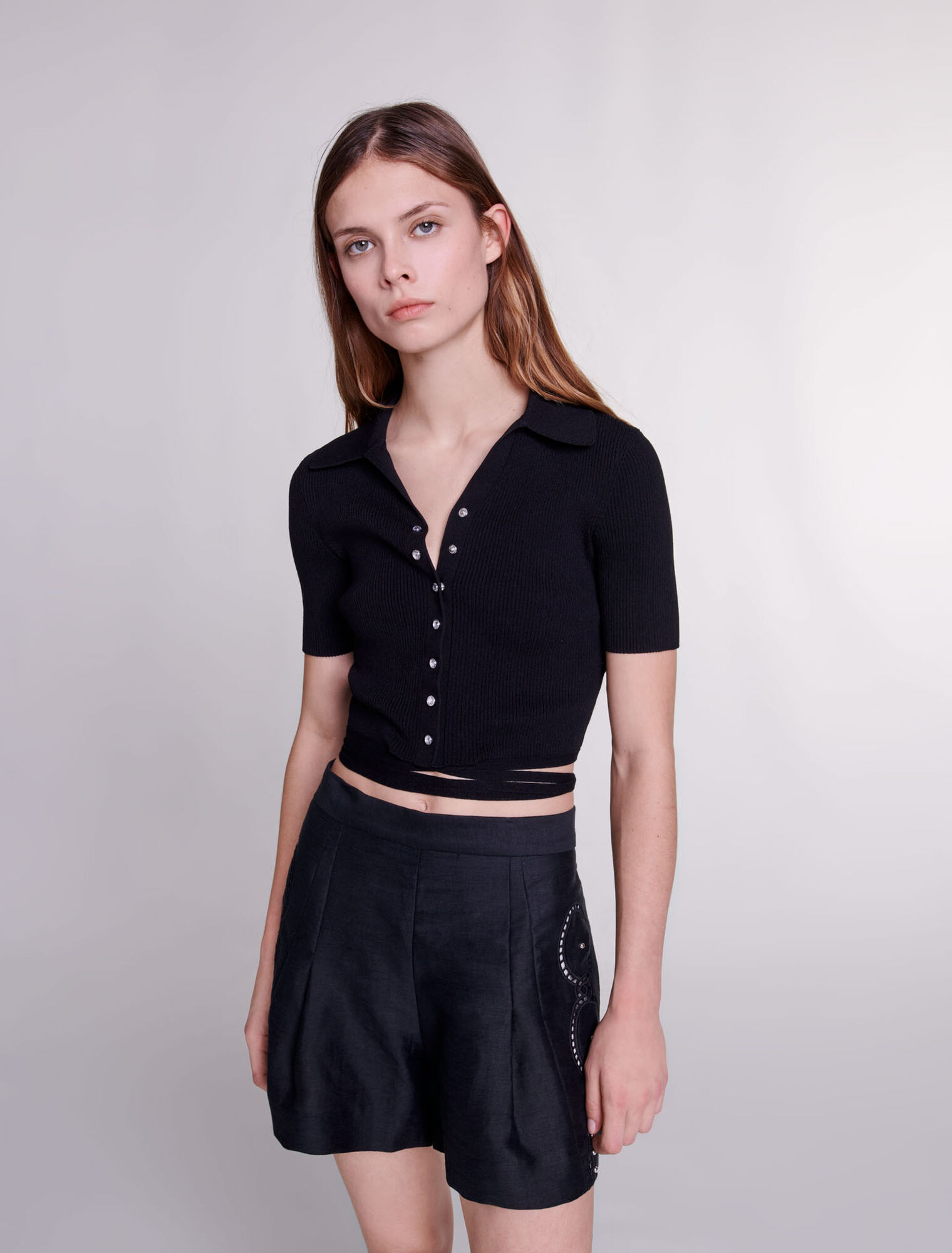 Shorts lino traforato con rivetti