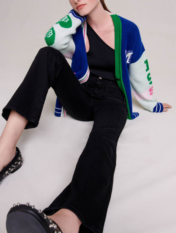 Jeans neri tasche e finiture intrecciate