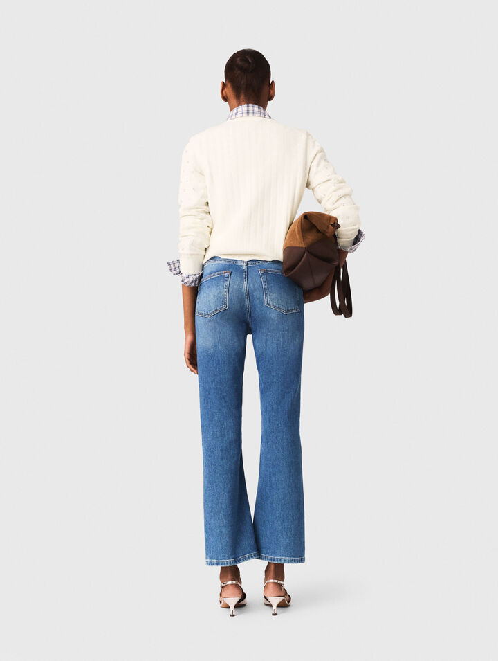 Jeans in denim con tasche