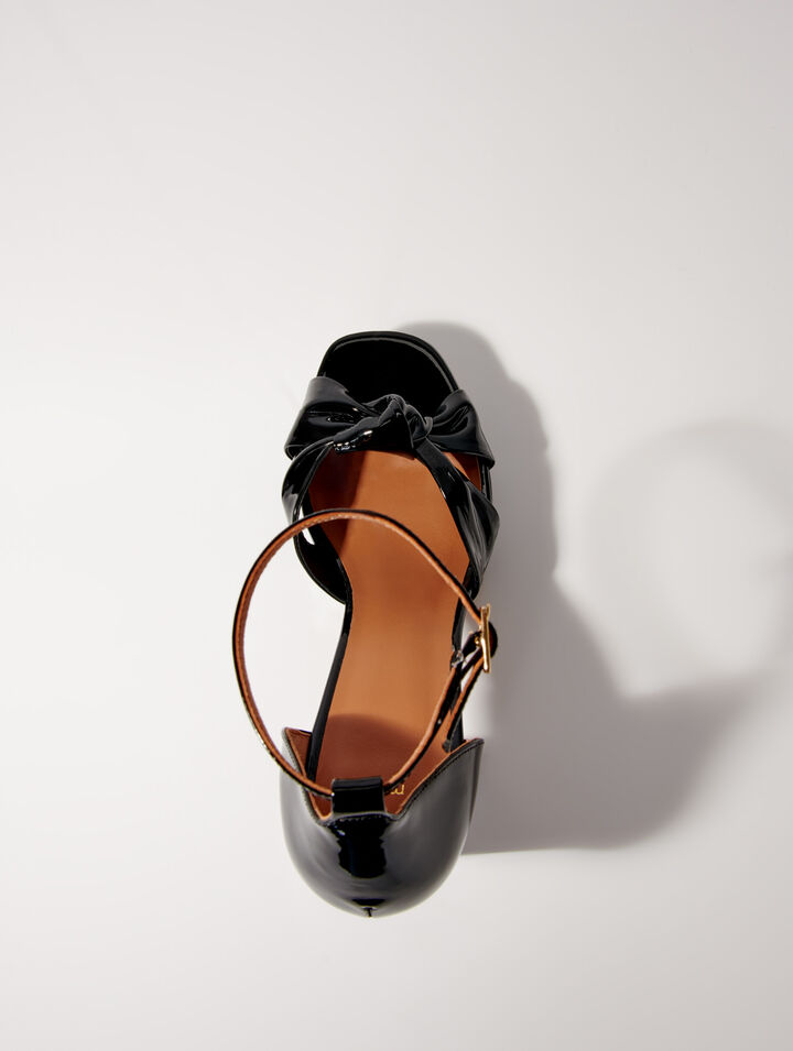 Sandali in pelle con zeppa