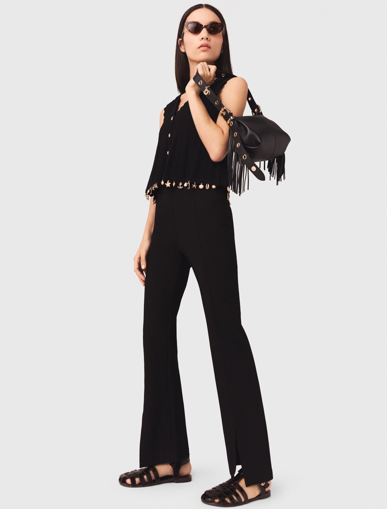 Pantaloni con spacco