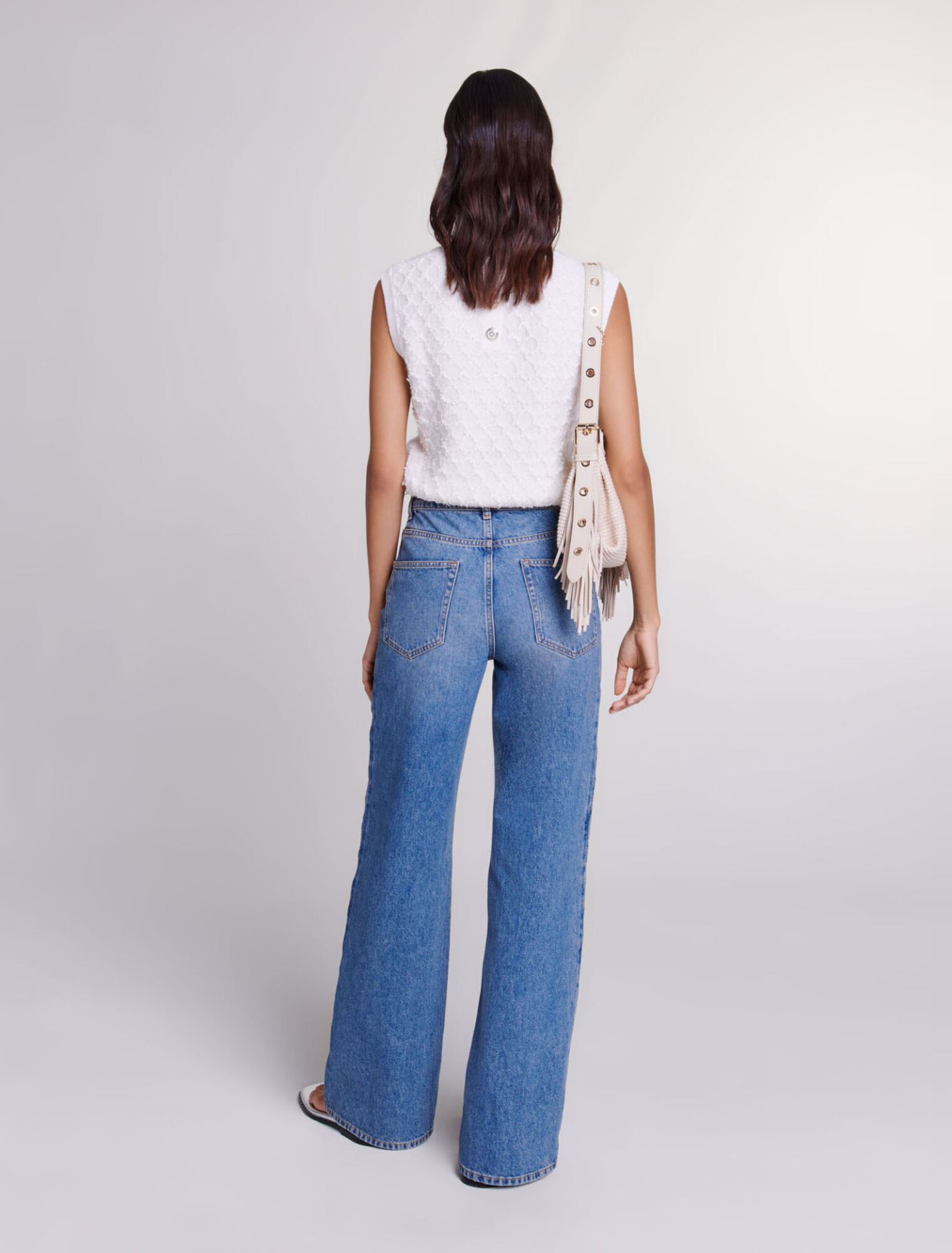 Jeans dritti traforati con perline