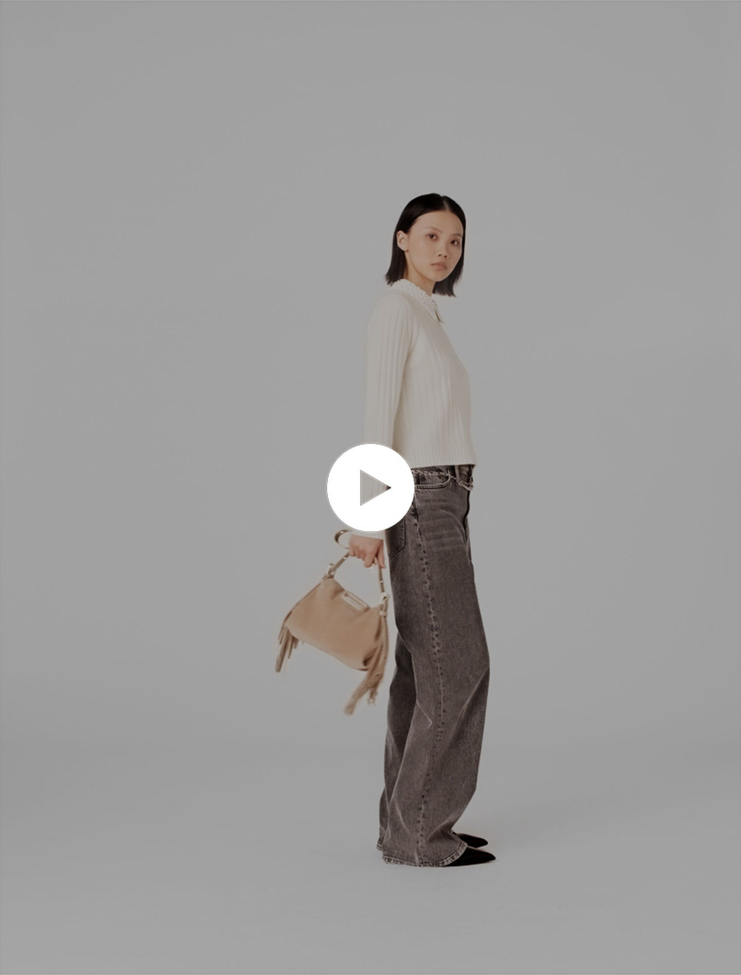 Pullover a coste con collo perle