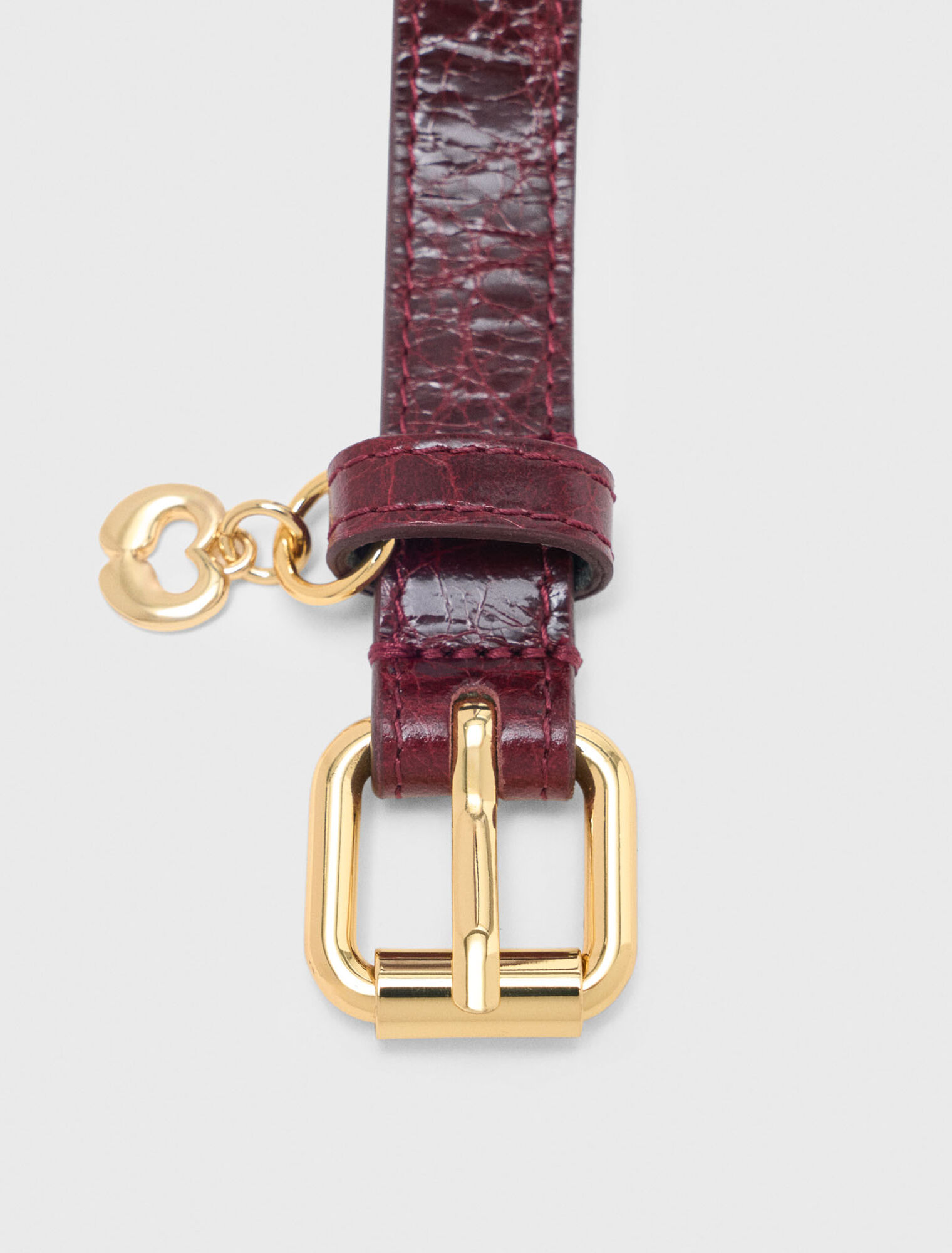 Cintura fine in pelle con occhielli