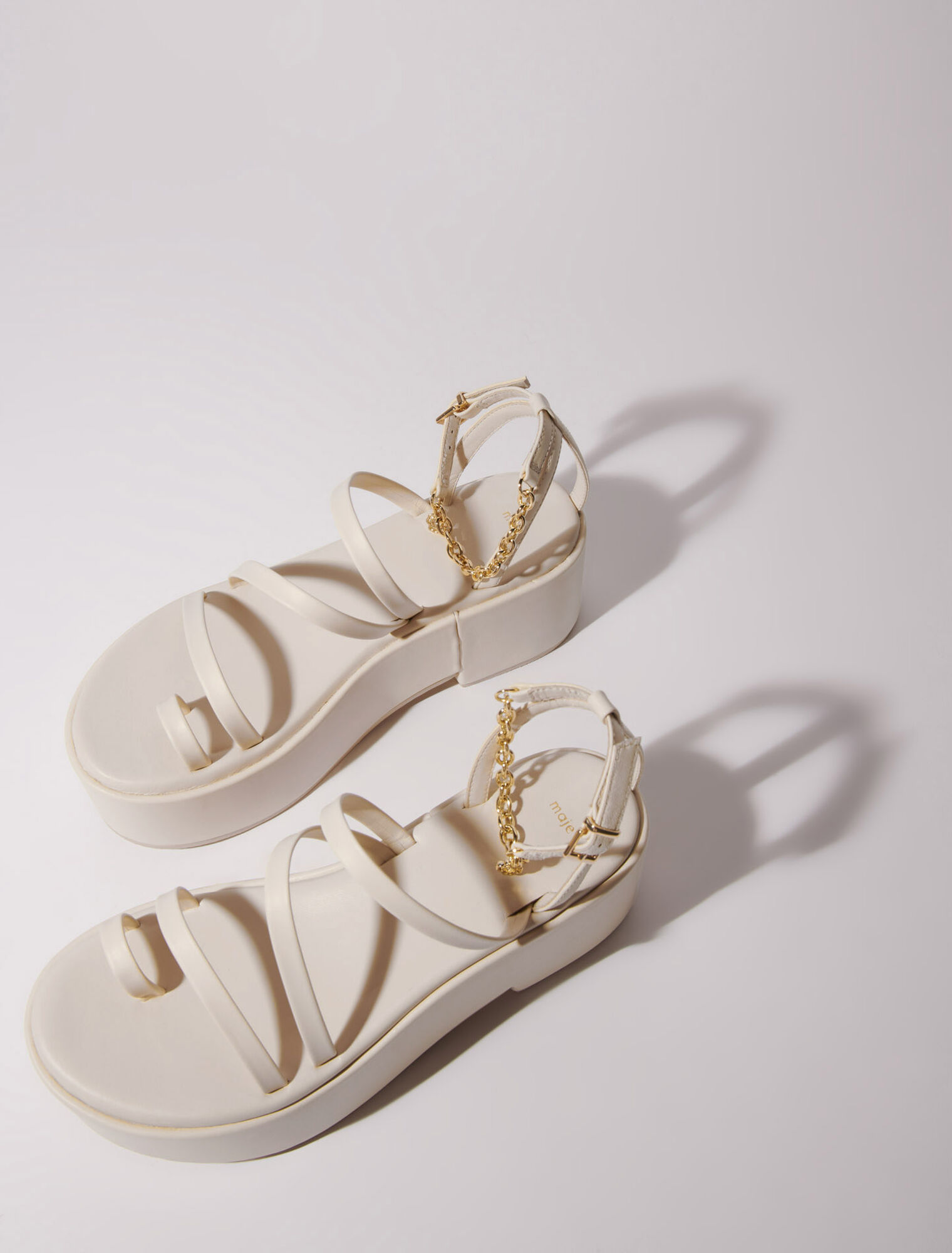Sandali con zeppa in pelle
