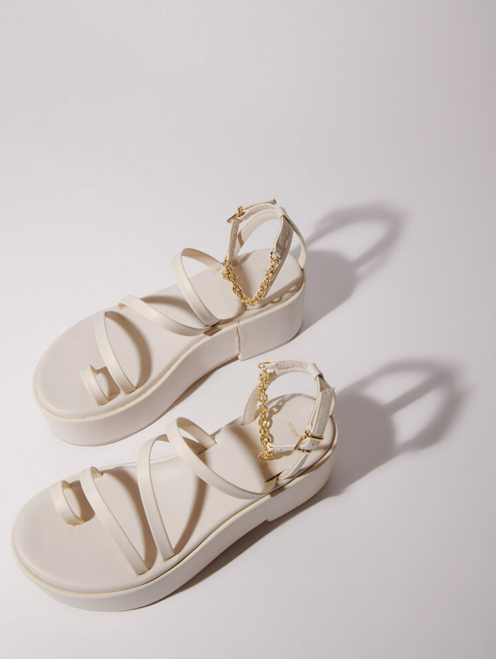 Sandali con zeppa in pelle