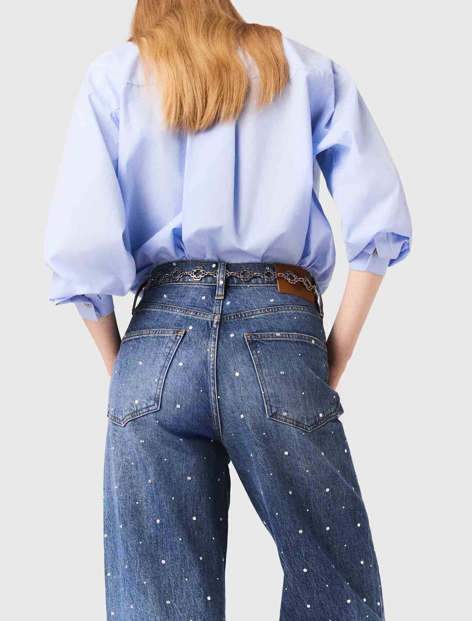 Jeans larghi in denim con borchie