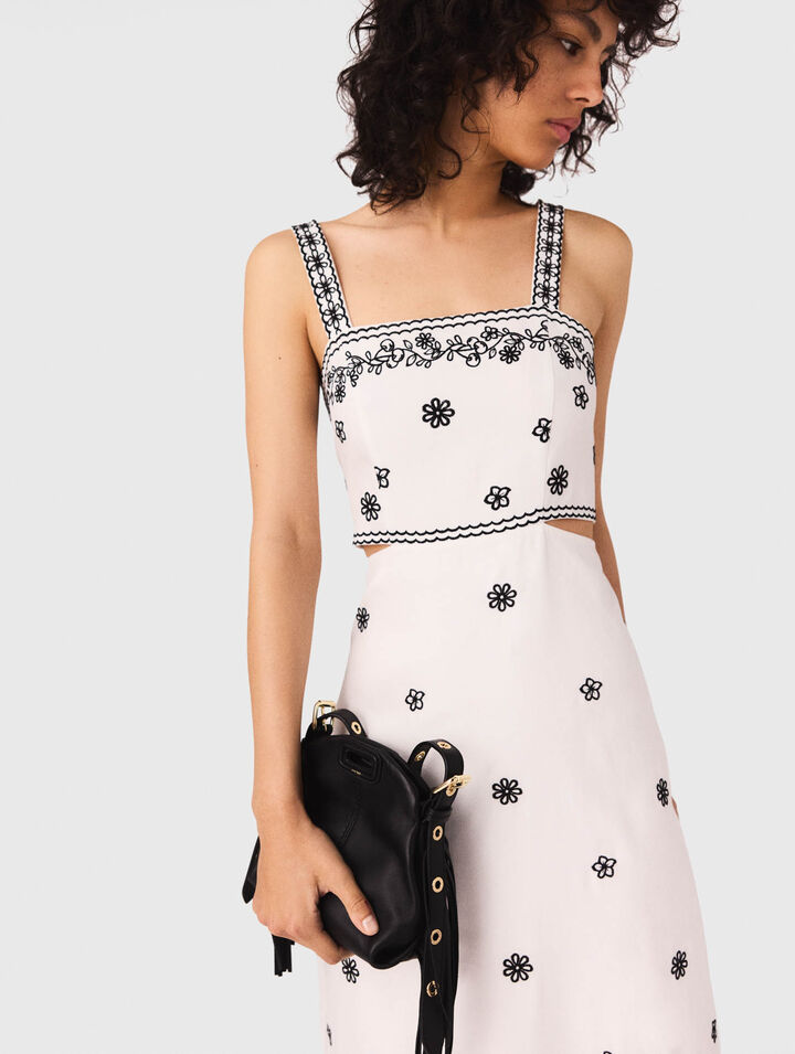 Abito lungo ricamato con cut-out