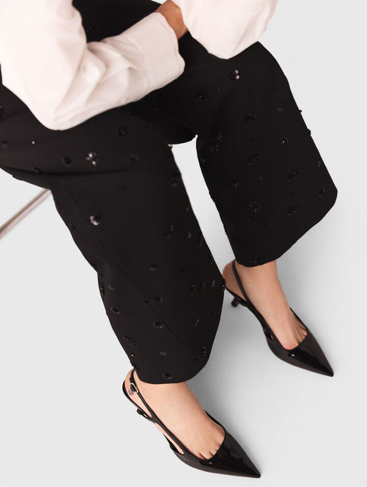 Pantaloni ricamati con bretelle