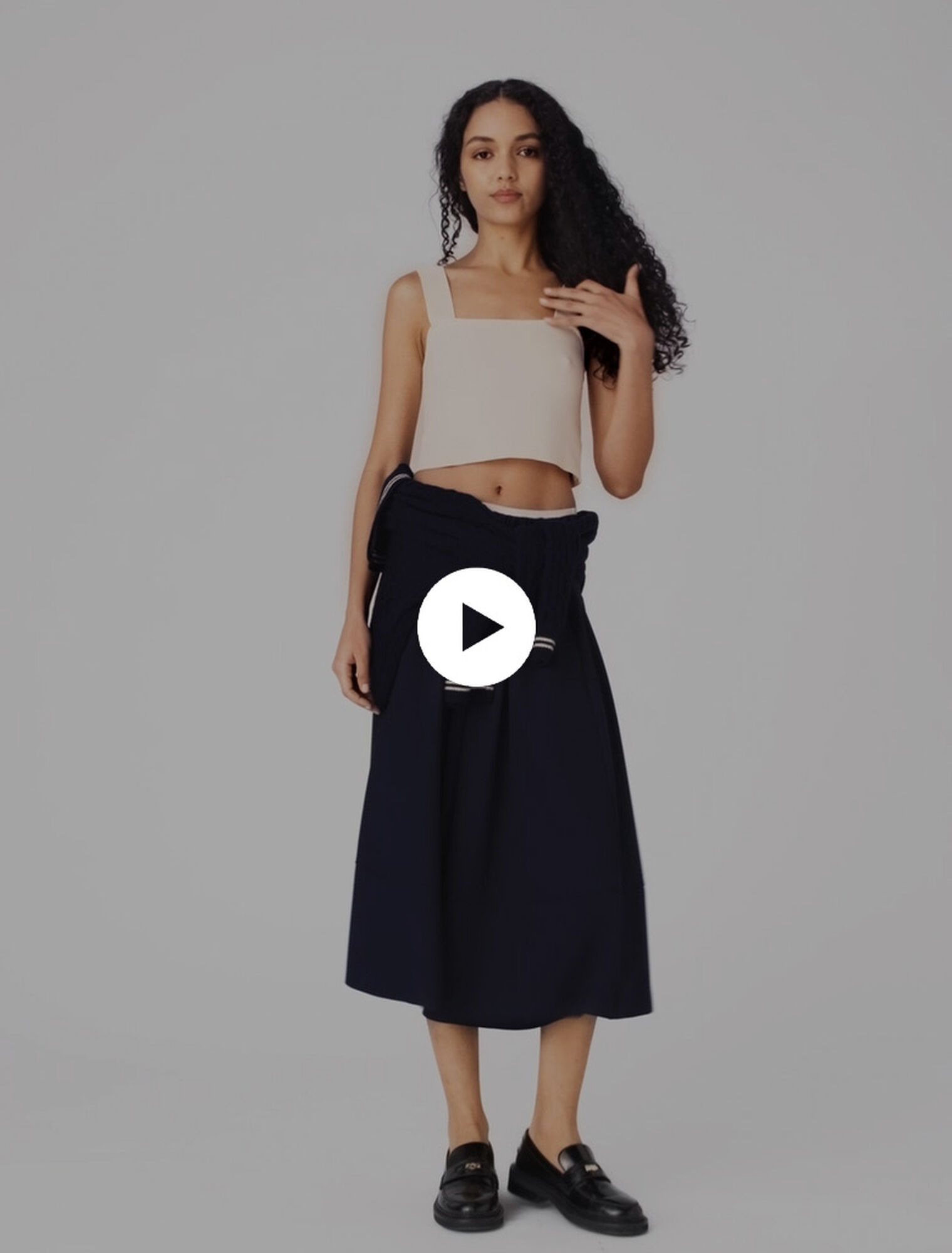 Top crop in maglia con spalline