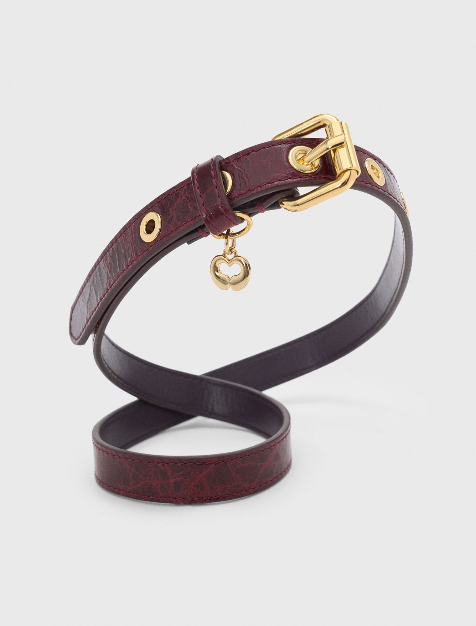 Cintura fine in pelle con occhielli