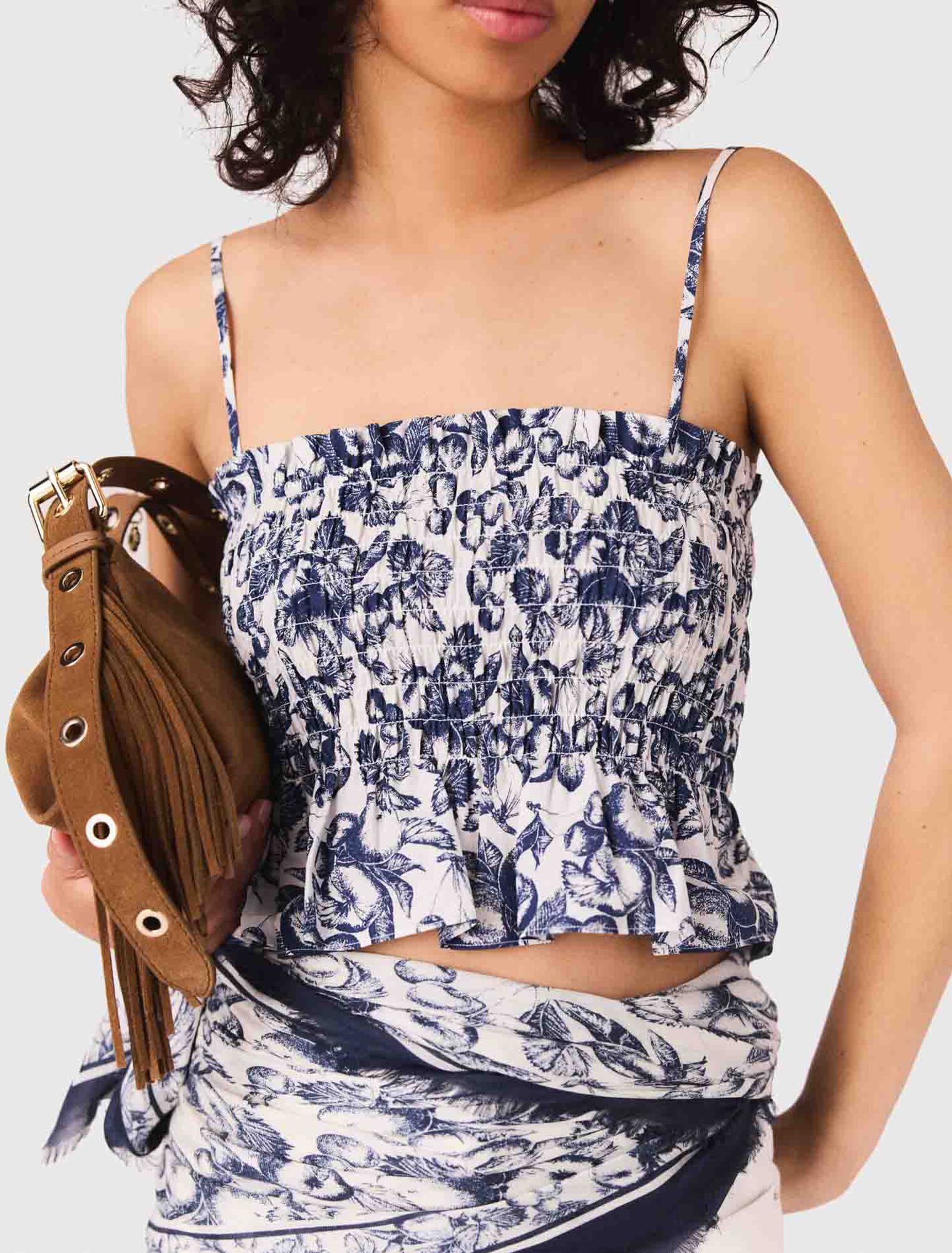 Top a punto smock stampato