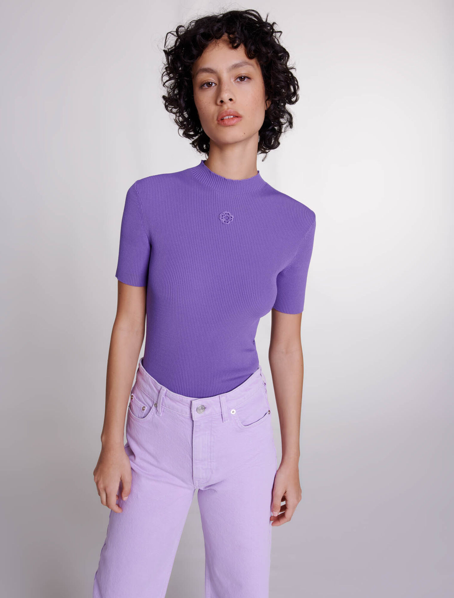 Top con ricamo Clover