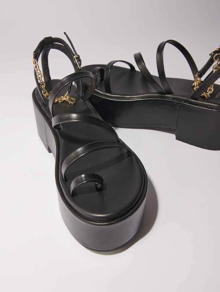 Sandali con zeppa in pelle