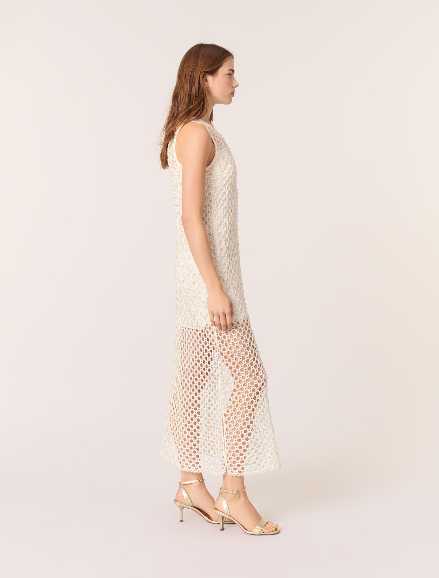 Abito lungo in crochet con perline