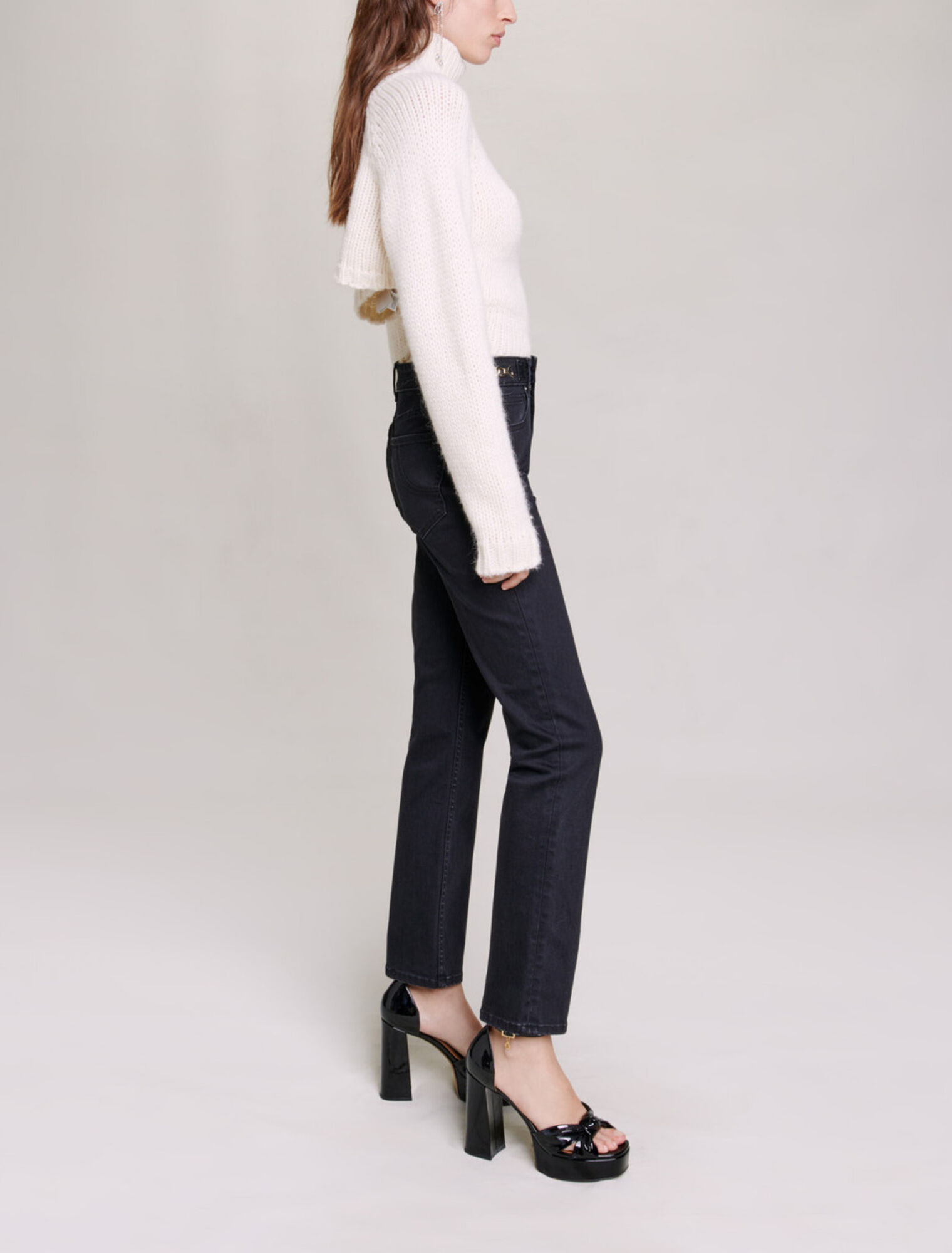 Jeans con catene e frange