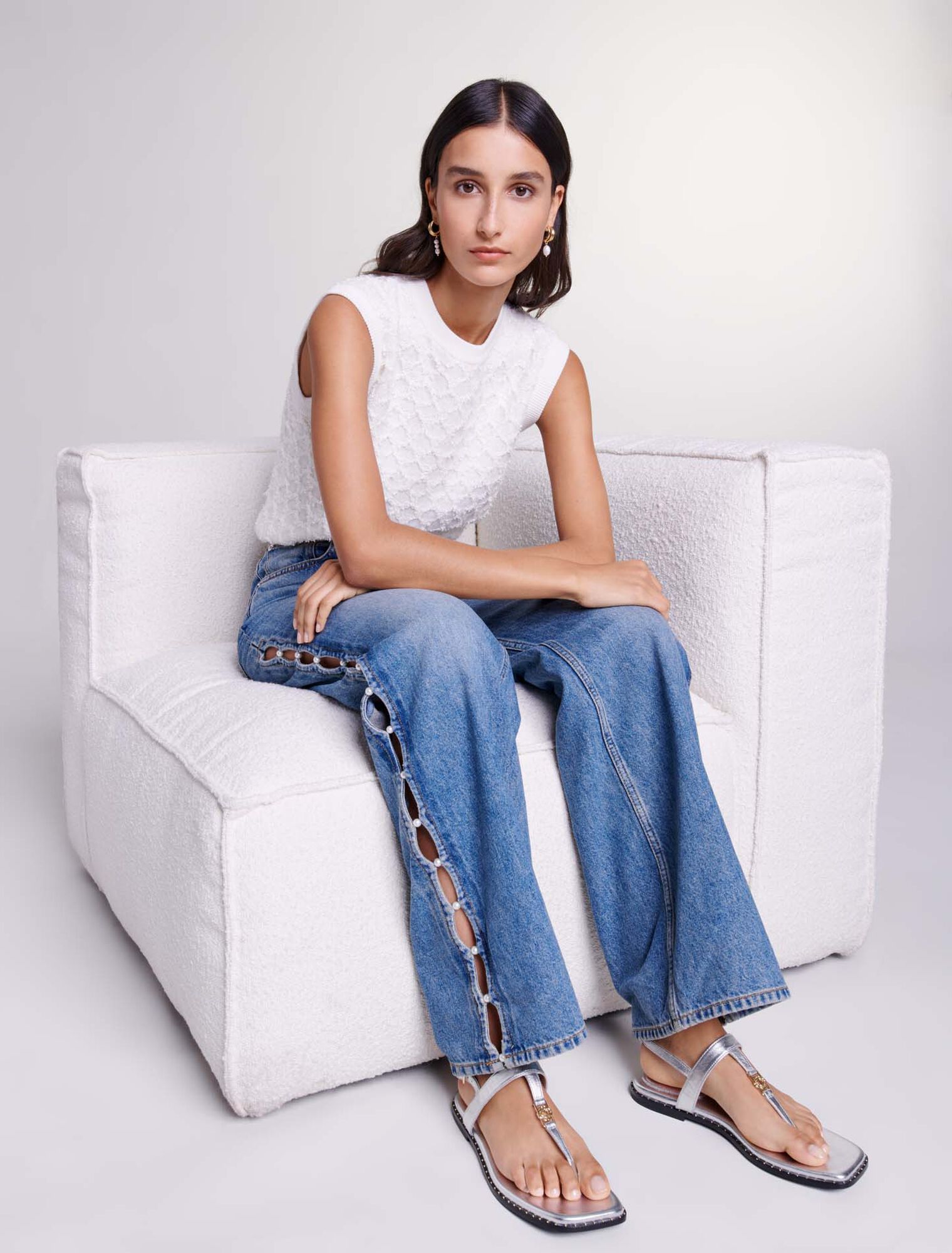 Jeans dritti traforati con perline