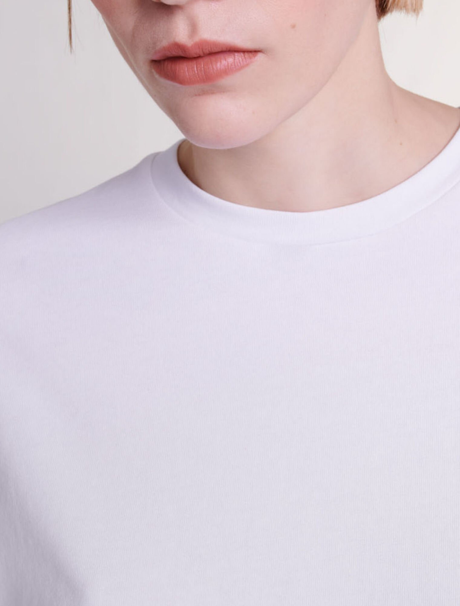 T-shirt con dettagli a occhielli