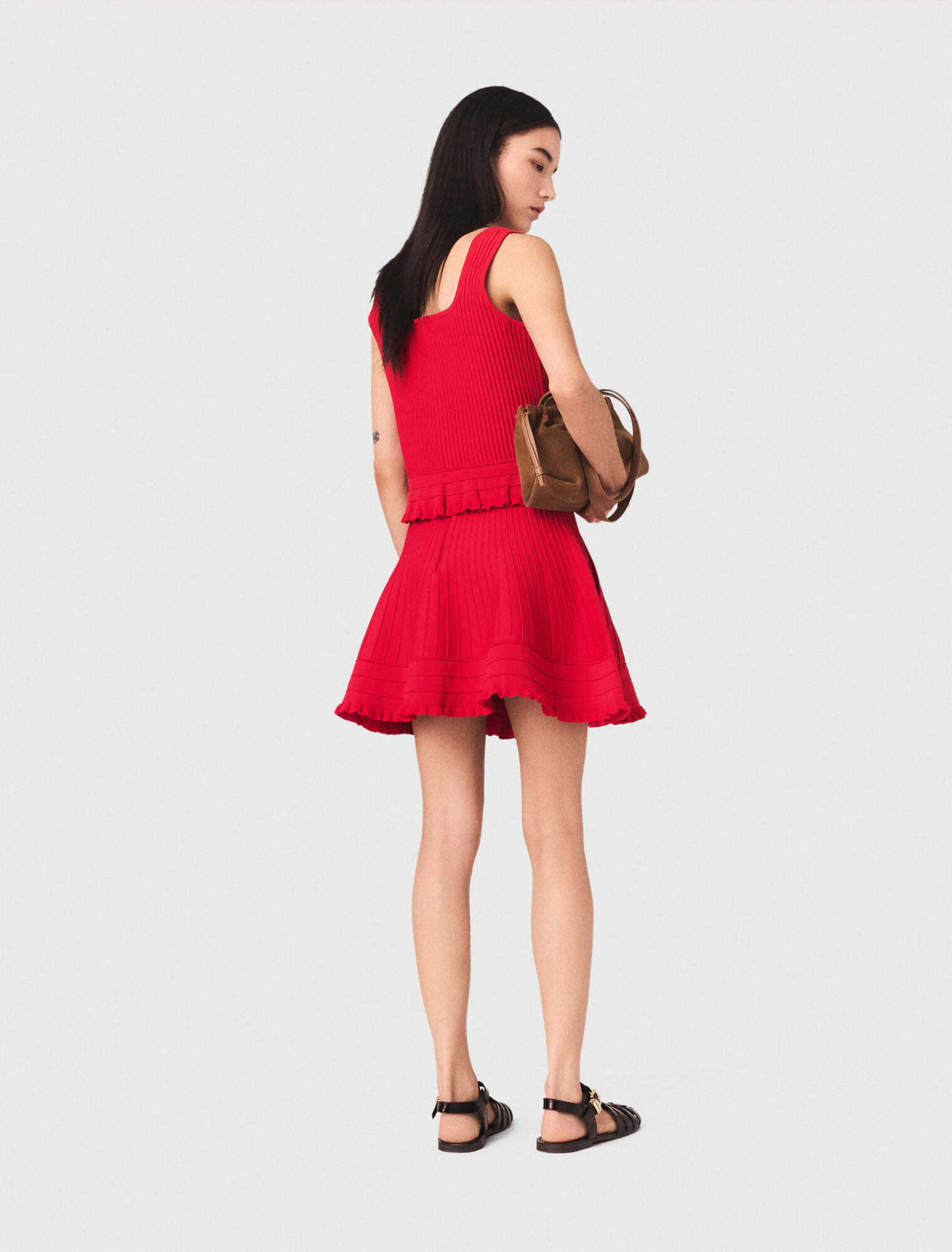 Top in maglia con volant