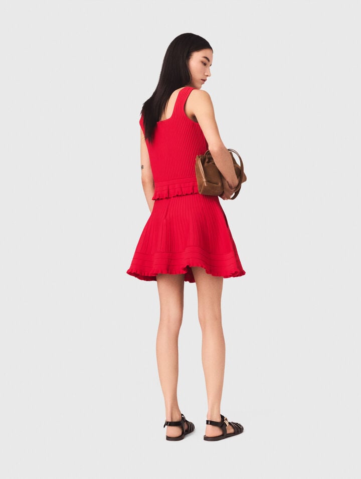 Top in maglia con volant