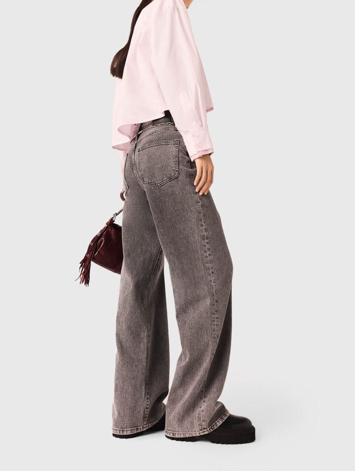 Jeans larghi e cintura a maglie