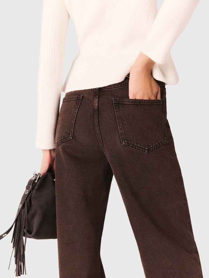Jeans bootcut con catena