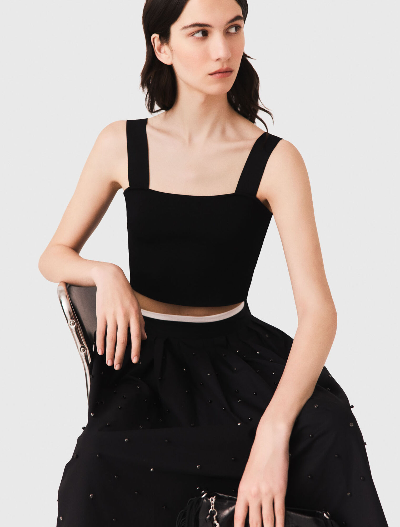 Top crop in maglia con spalline