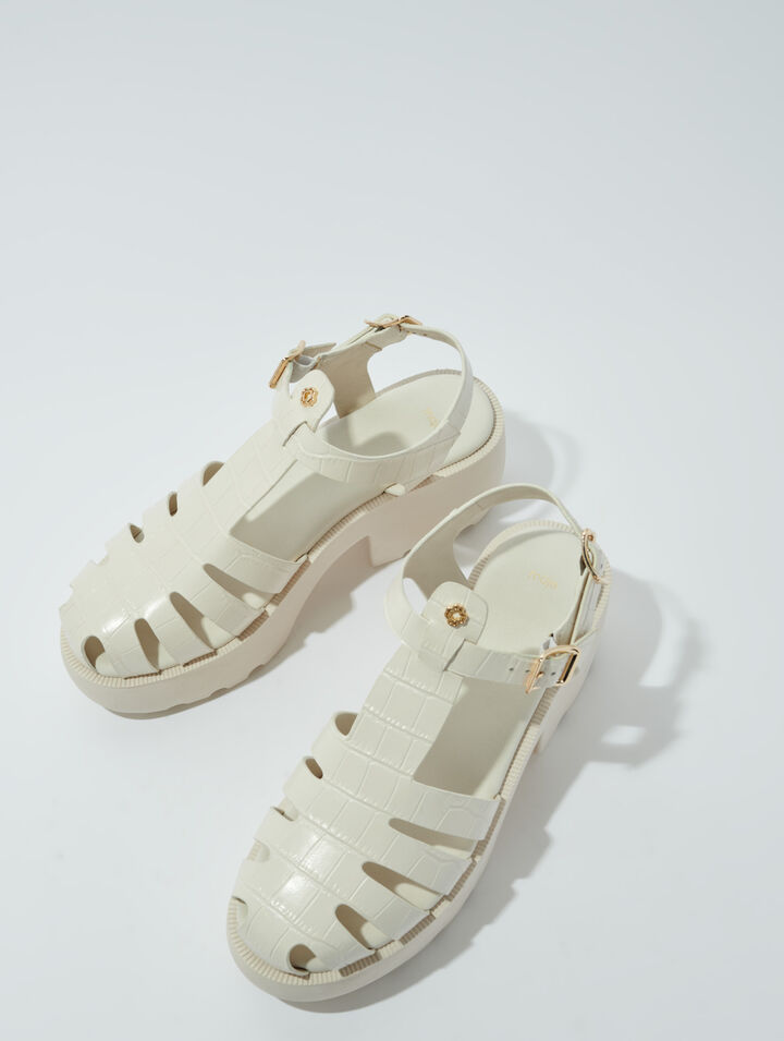 Sandali dentellati in pelle