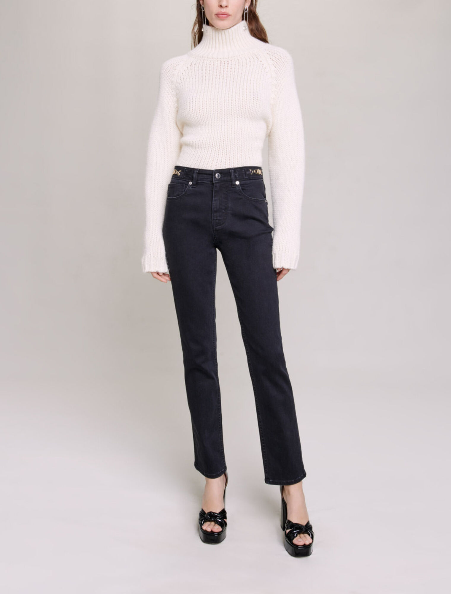 Jeans con catene e frange