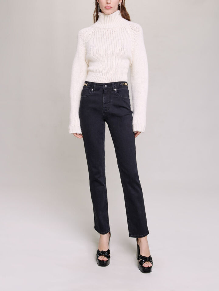 Jeans con catene e frange