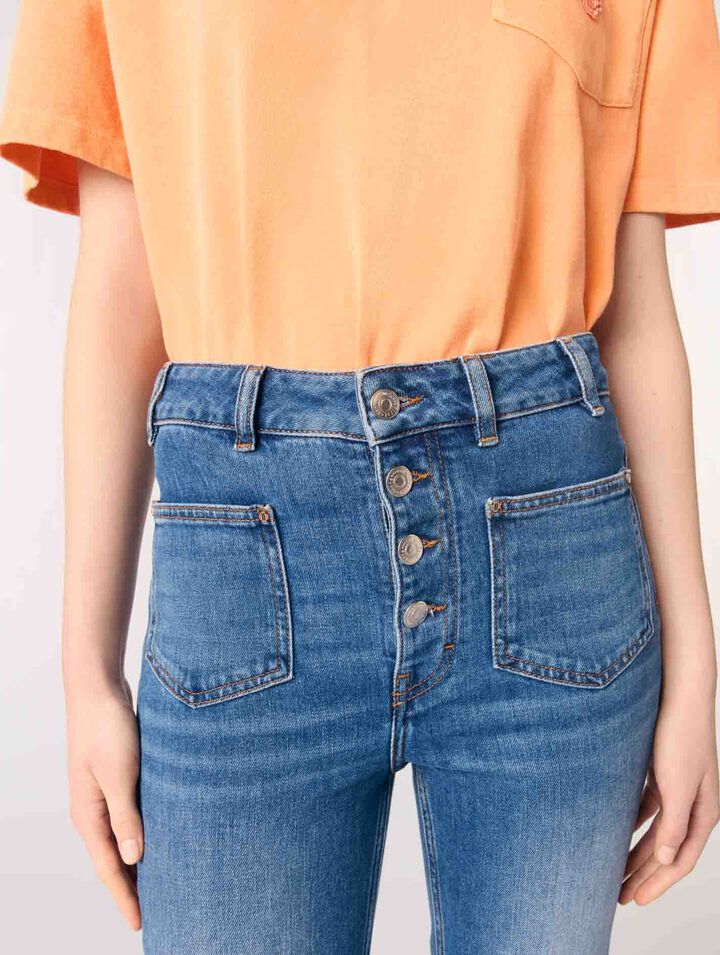 Jeans in denim con tasche