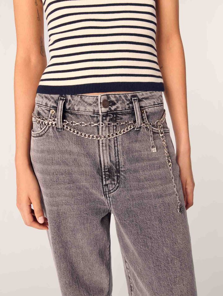 Jeans larghi e cintura a maglie