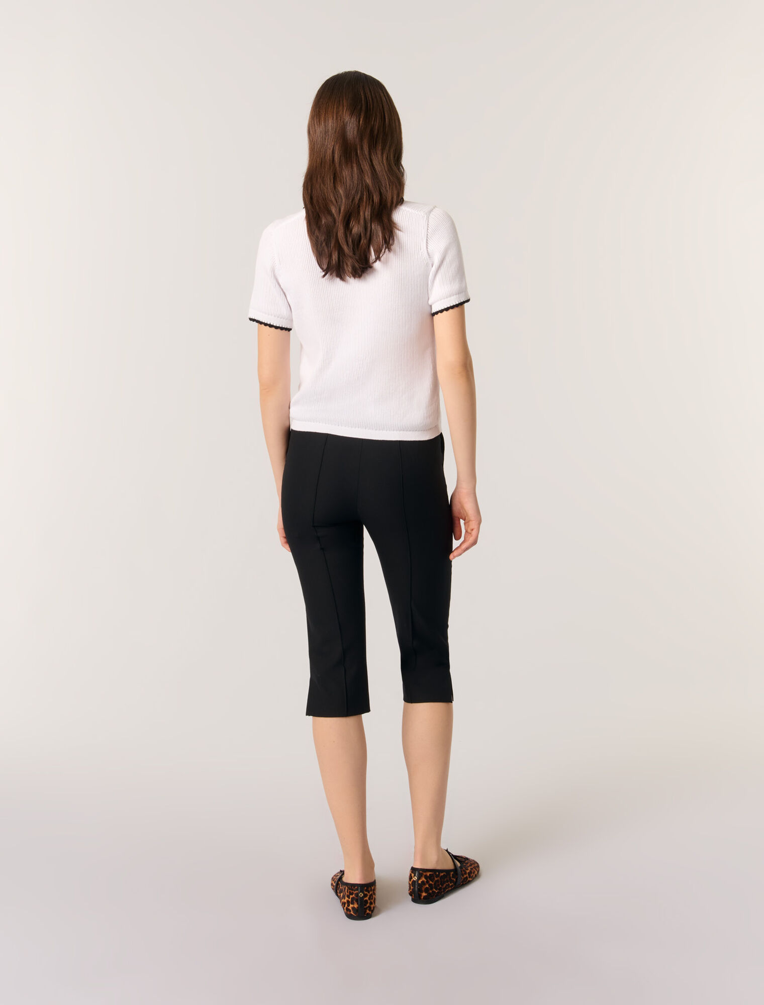 Polo in maglia pointelle e crochet