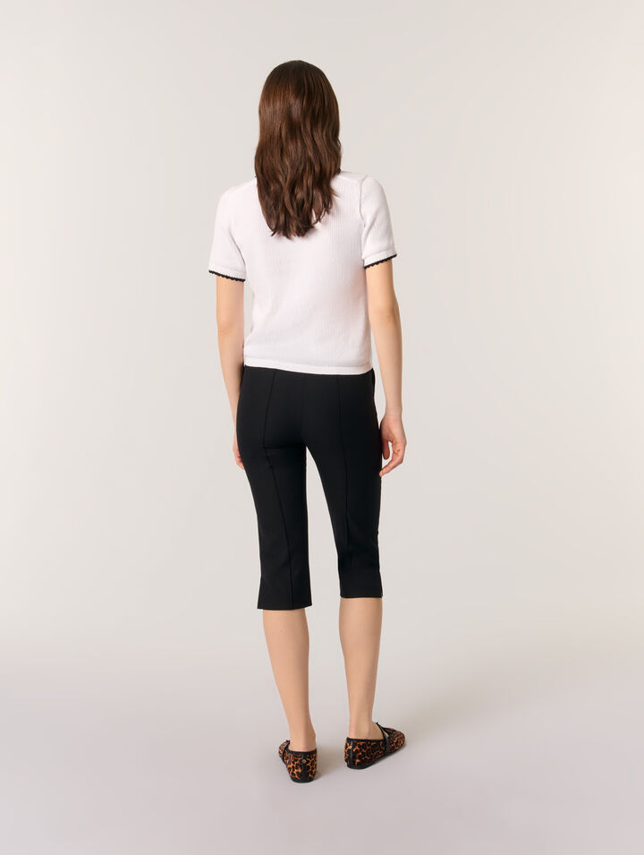 Polo in maglia pointelle e crochet