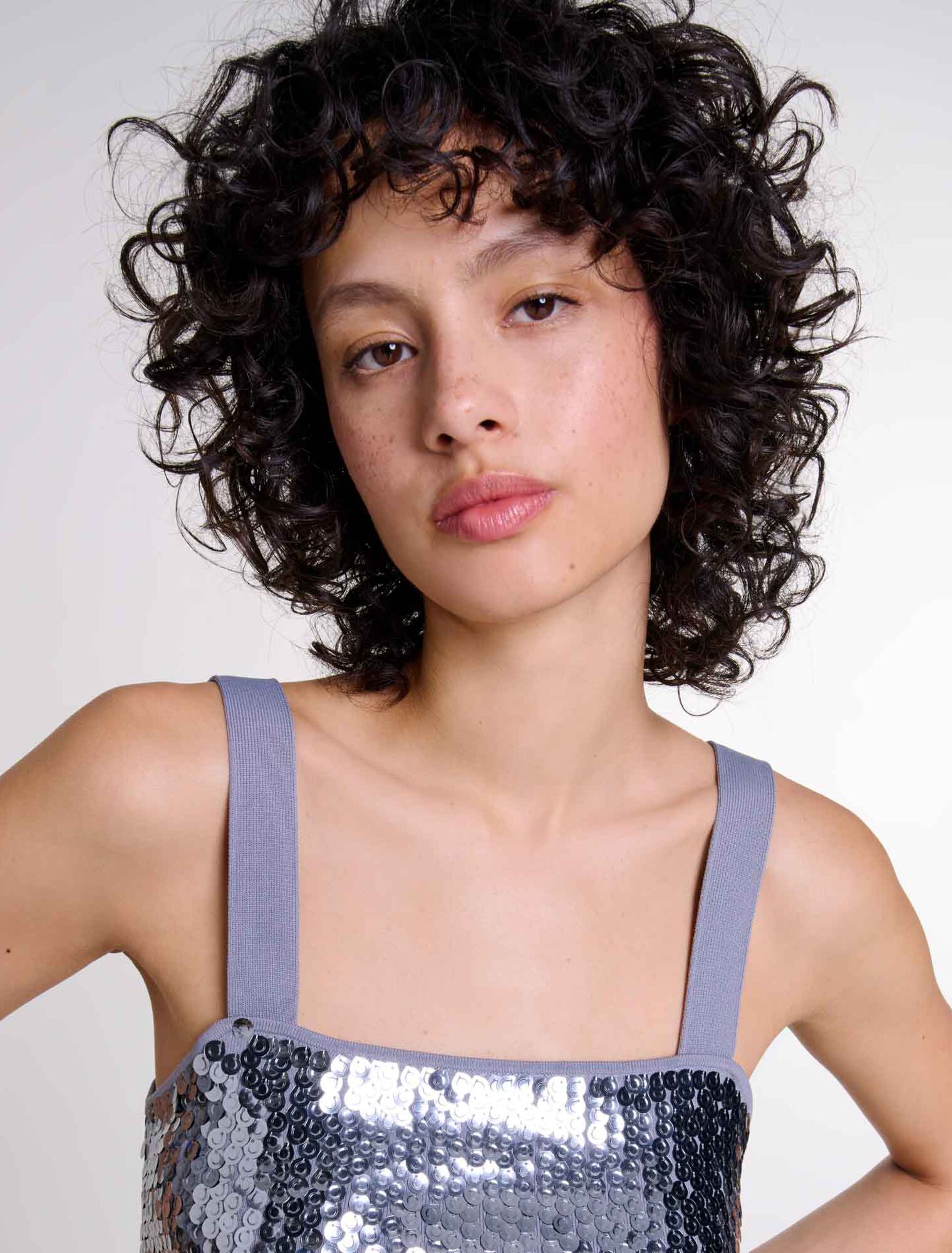 Top in maglia glitterata