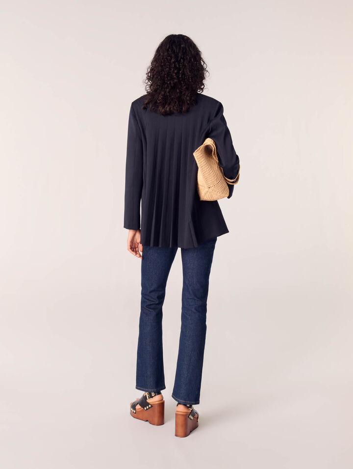 Jeans in denim con tasche