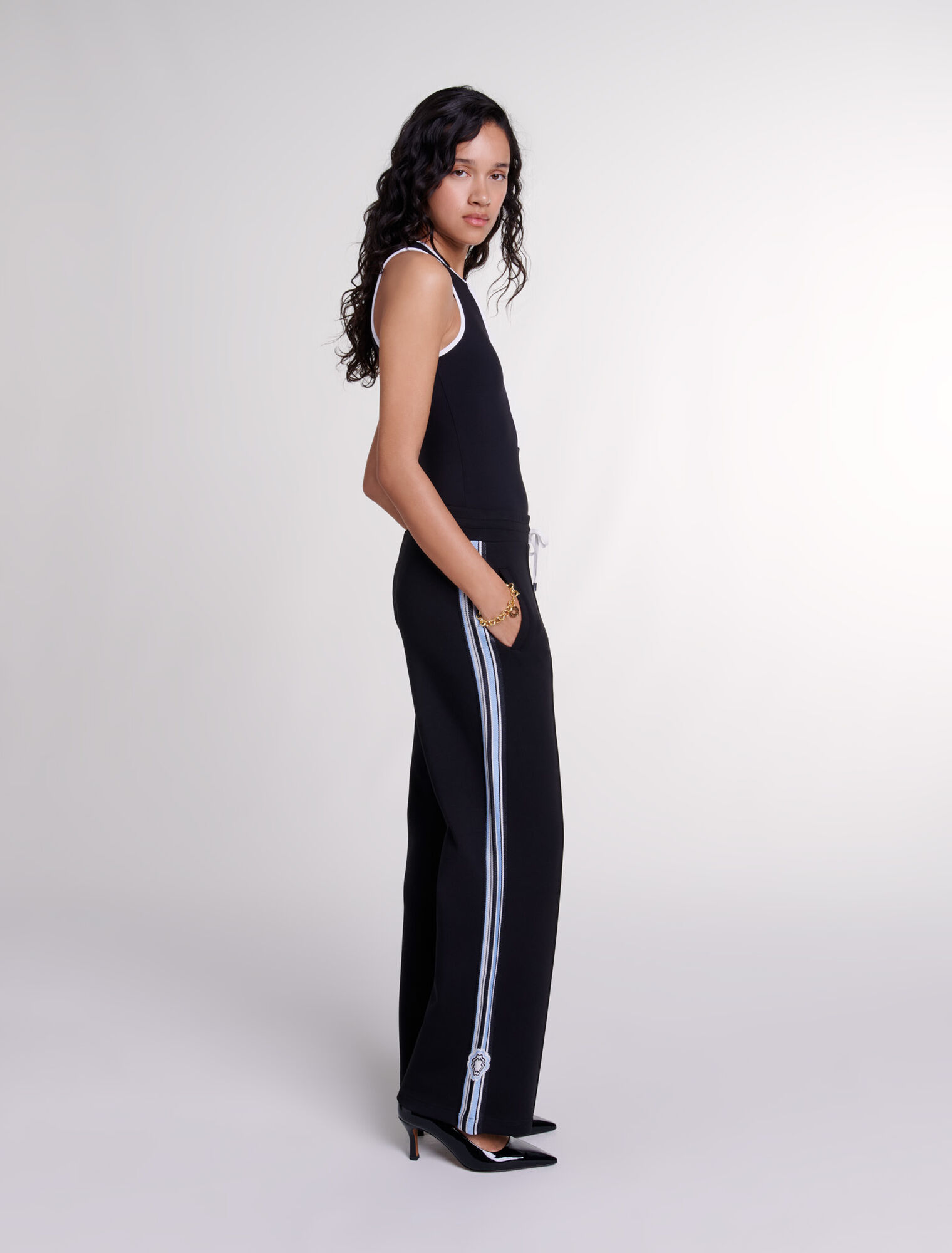 Pantaloni jogging larghi con bande