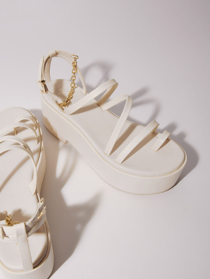 Sandali con zeppa in pelle