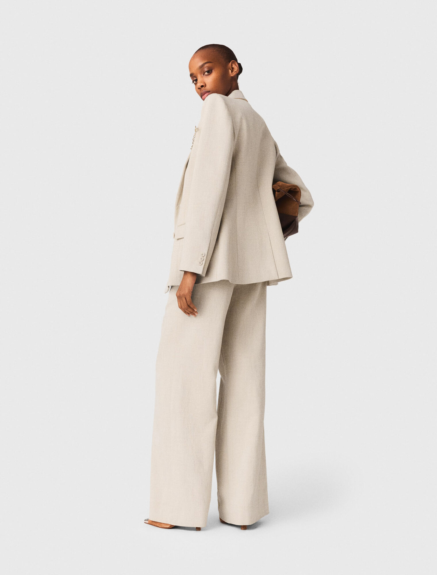 Giacca da tailleur con spilla