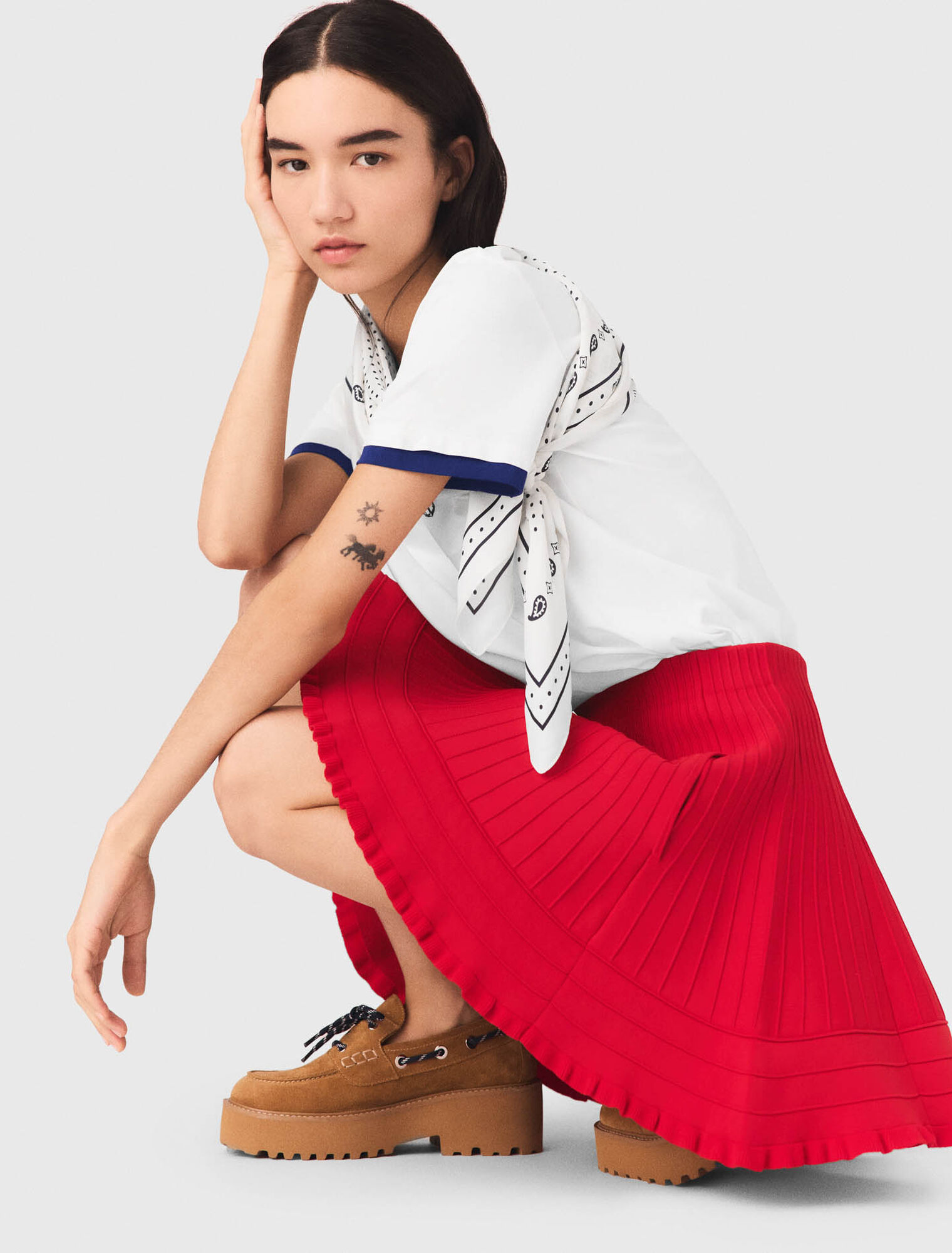 Gonna corta in maglia compatta