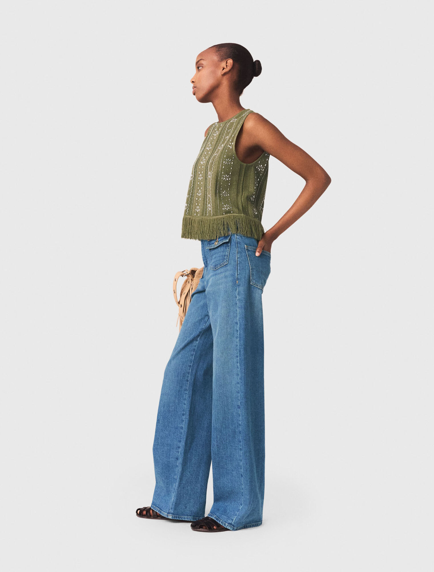 Top con fiori di strass e frange