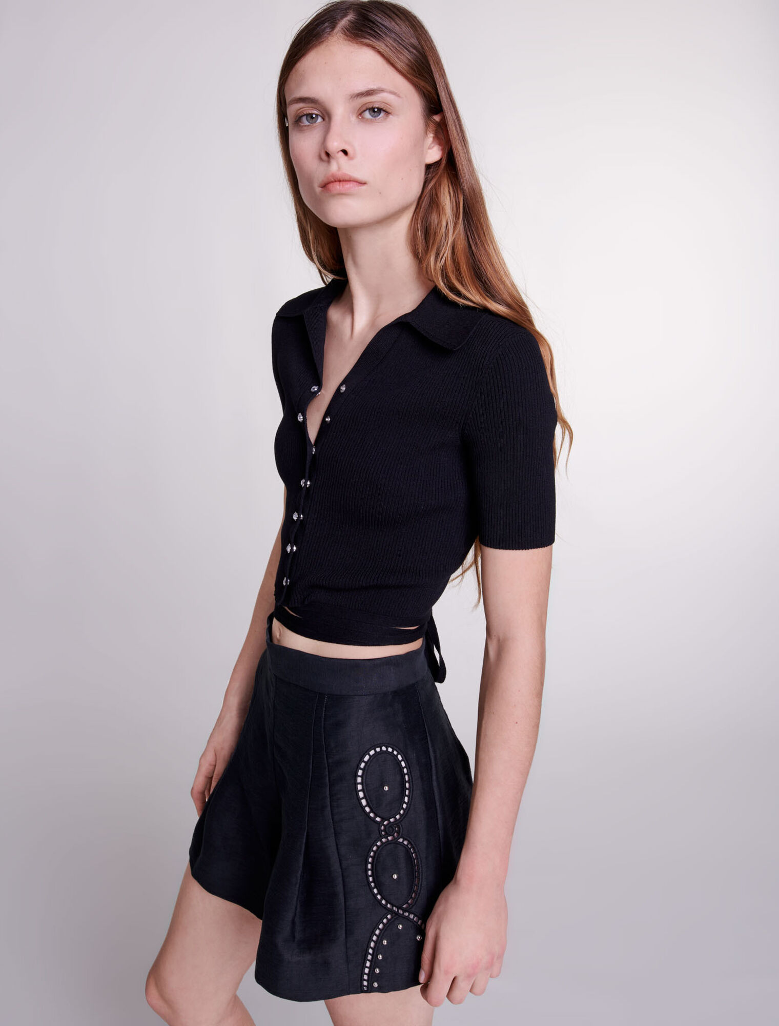 Shorts lino traforato con rivetti