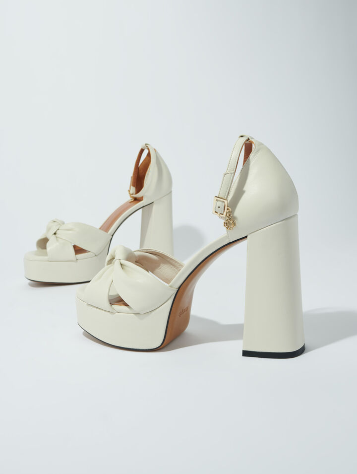 Sandali in pelle con zeppa