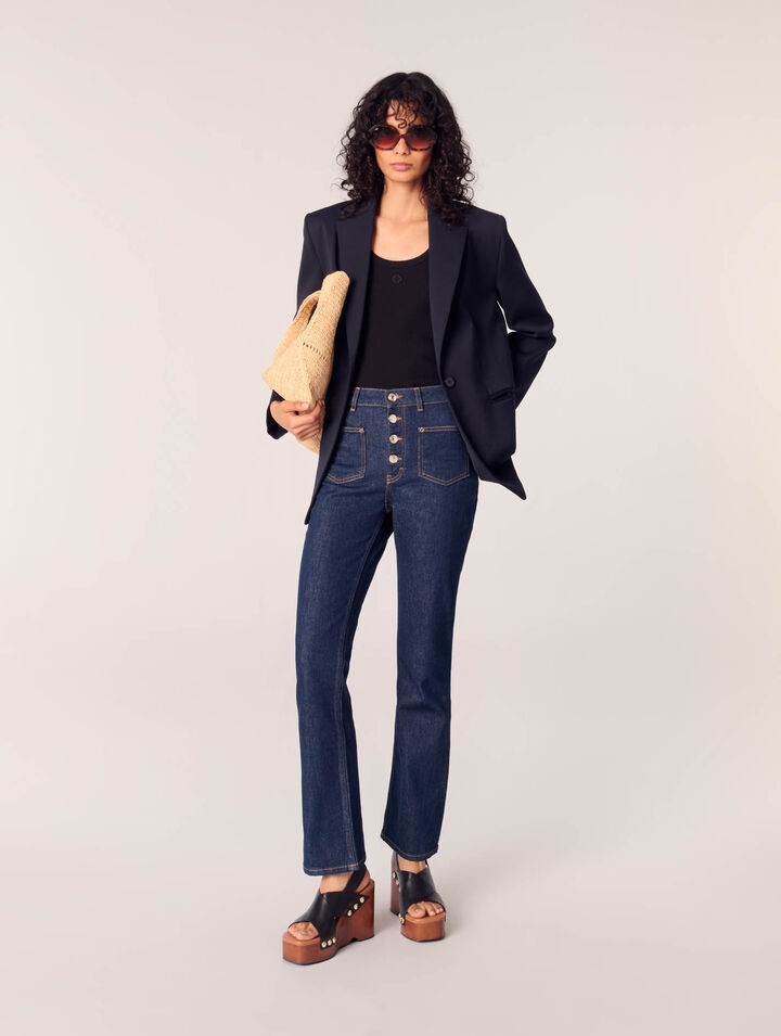 Jeans in denim con tasche