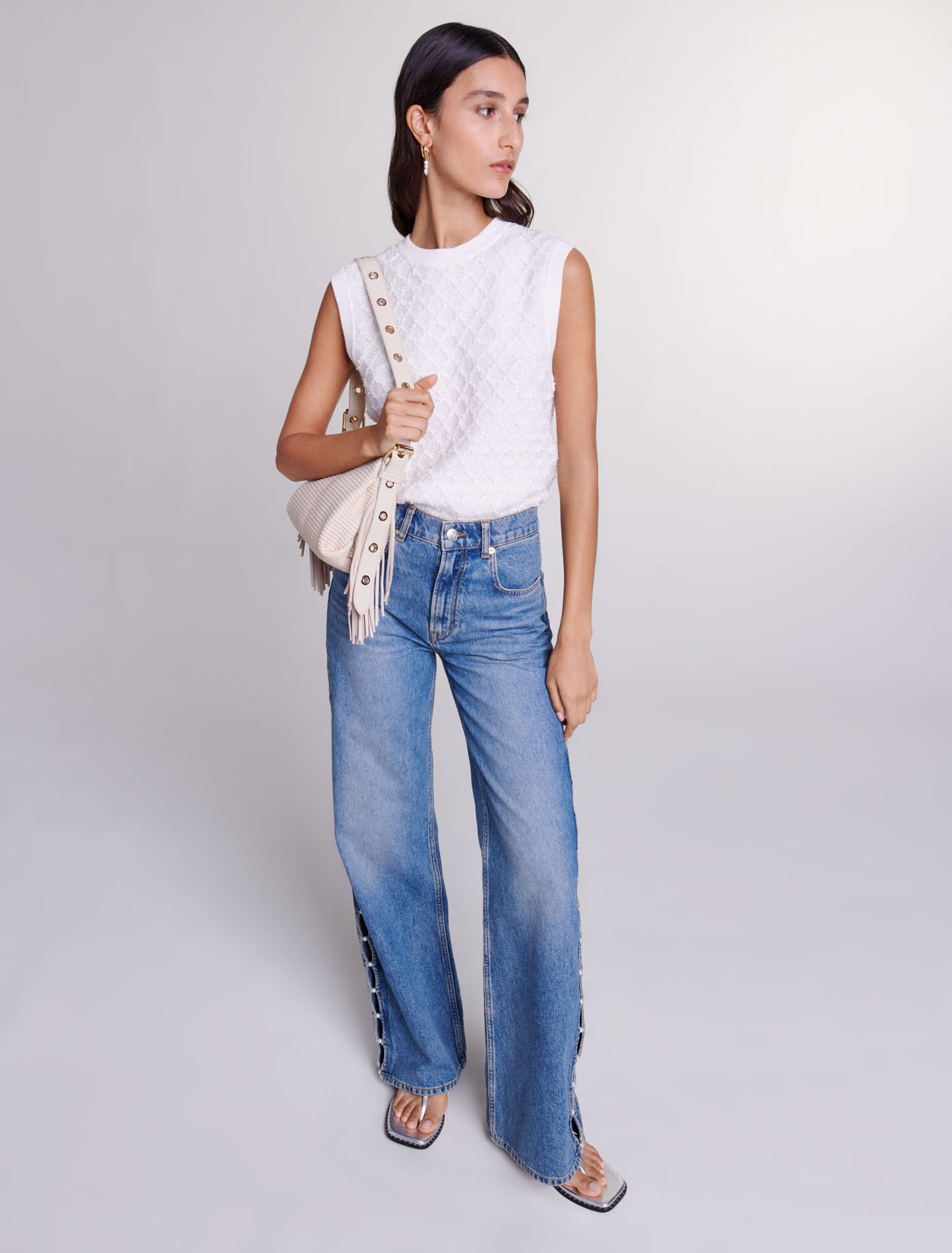 Jeans dritti traforati con perline