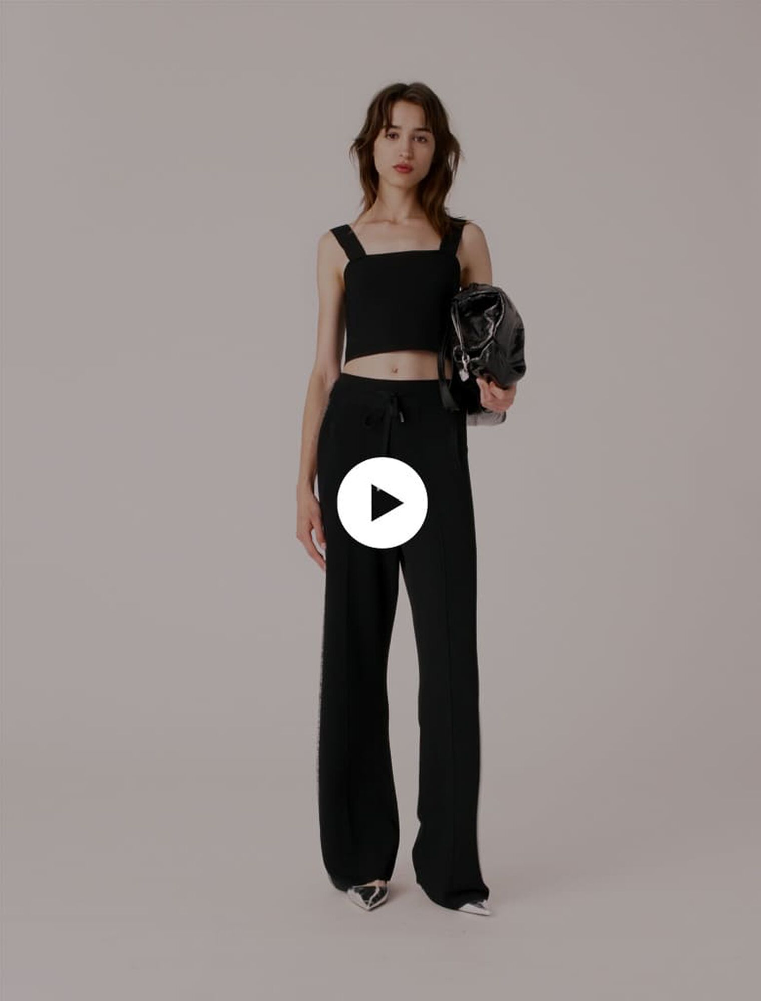 Top crop in maglia con spalline