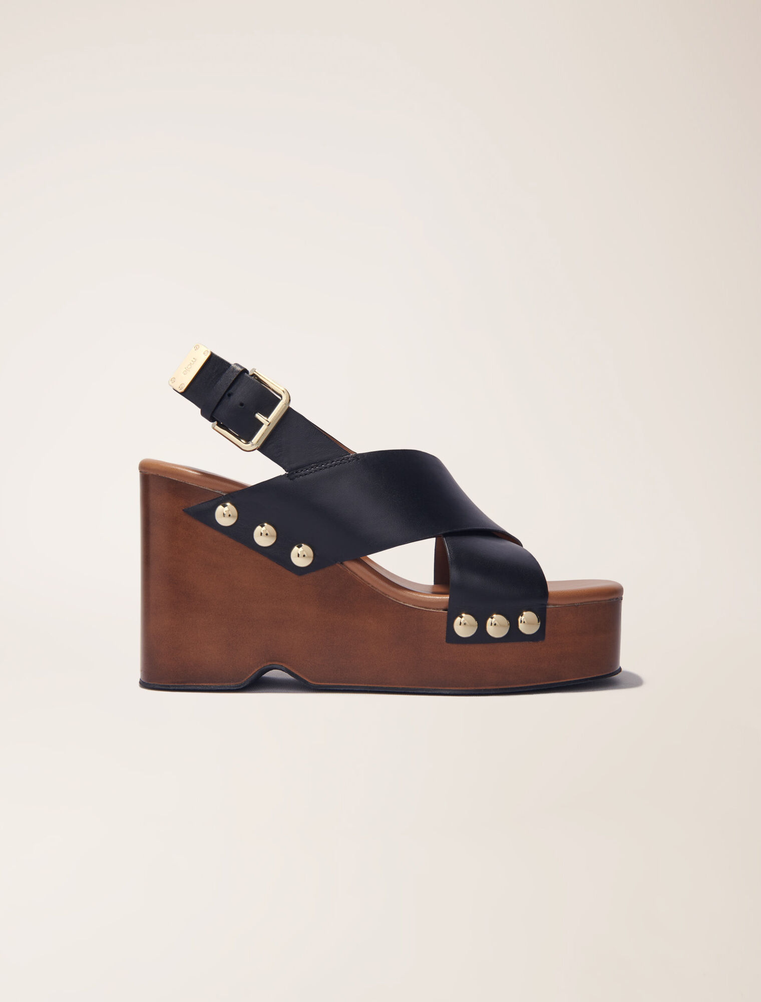 Sandali con zeppa in pelle