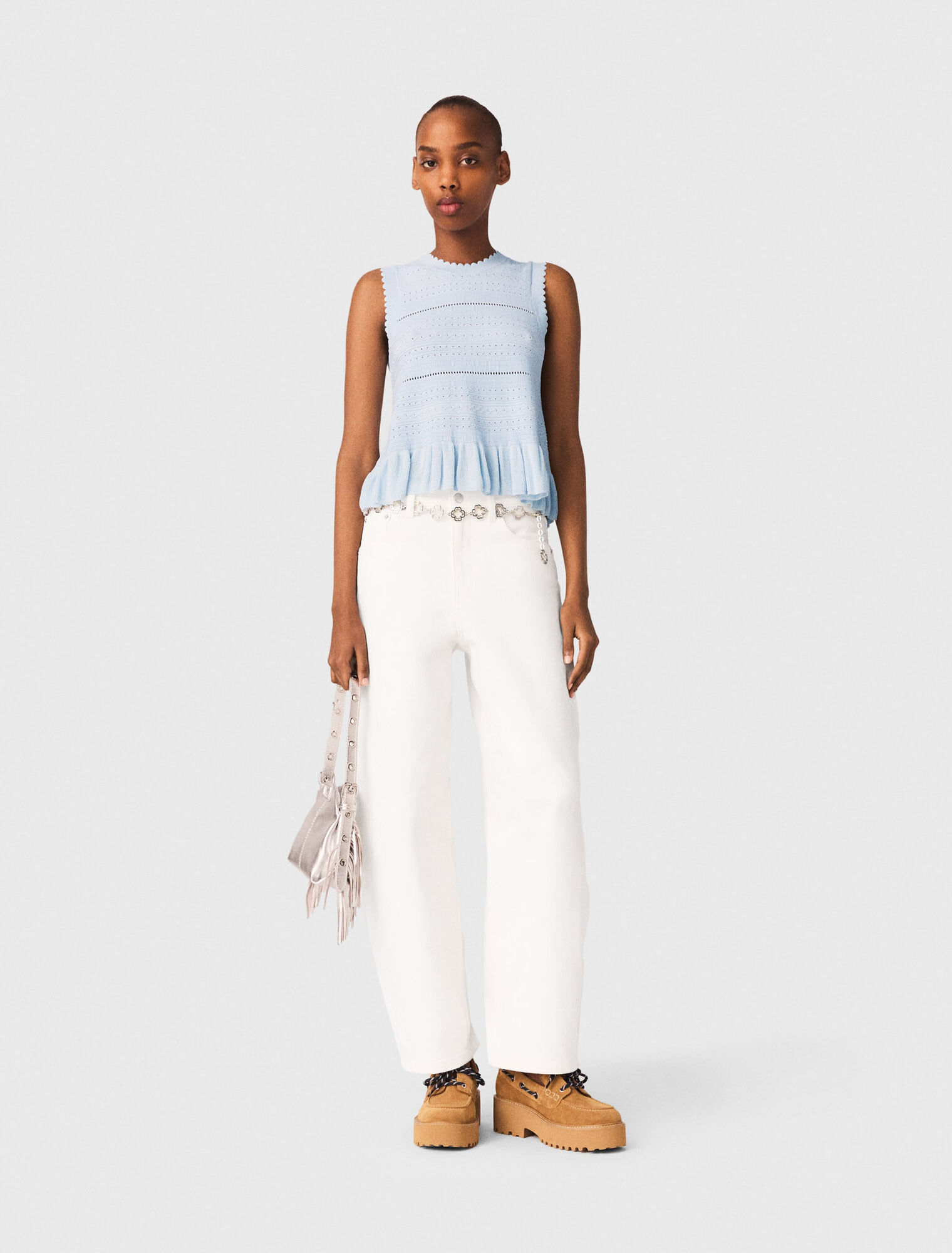 Top in maglia con volant